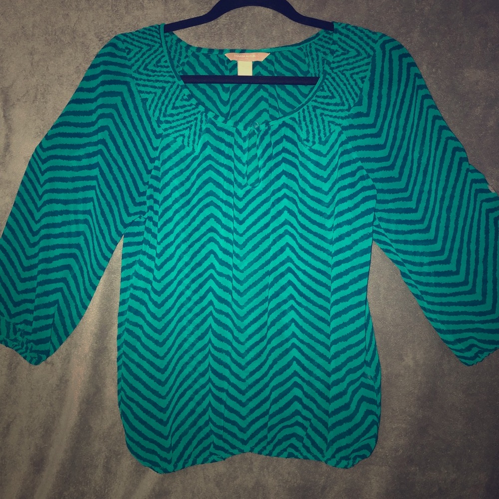Chic blouse, banded sleeves and waist.